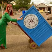 Izzy Balmer with the roll-in rostrum featured in The Travelling Auctioneers