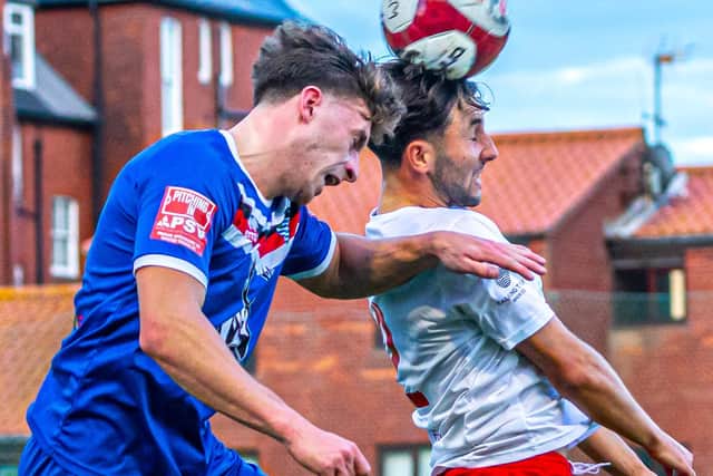 Coleby Shepherd challenges for a header during Whitby Town's 9-0 win on Tuesday evening. PHOTO BY BRIAN MURFIELD