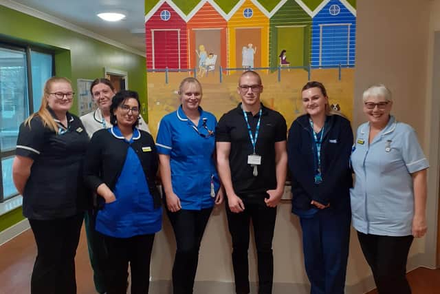 Jed with the team at Cross Lane Hospital