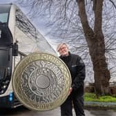 Coastliner bus driver Kornelia Holmes celebrates as the bus operator confirms its £2 ‘Price Drop’ fare cap will now continue until the end of October.