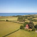 Glorious scenery and coast and country views surround this Grade ll=listed property that is rarely for sale.