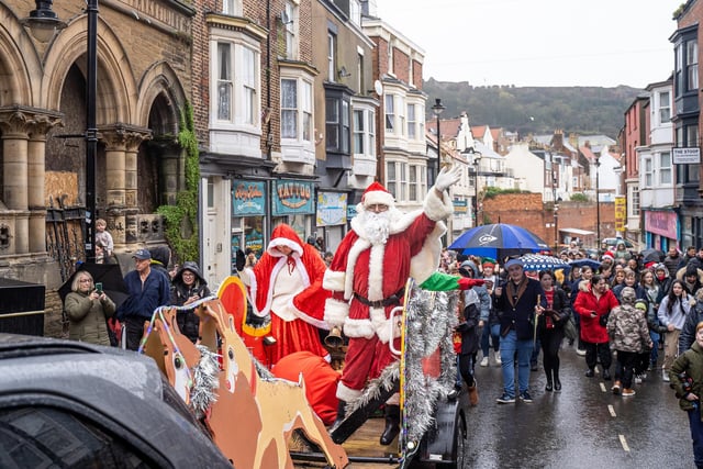 Santa and his elves making their way up Eastborough.