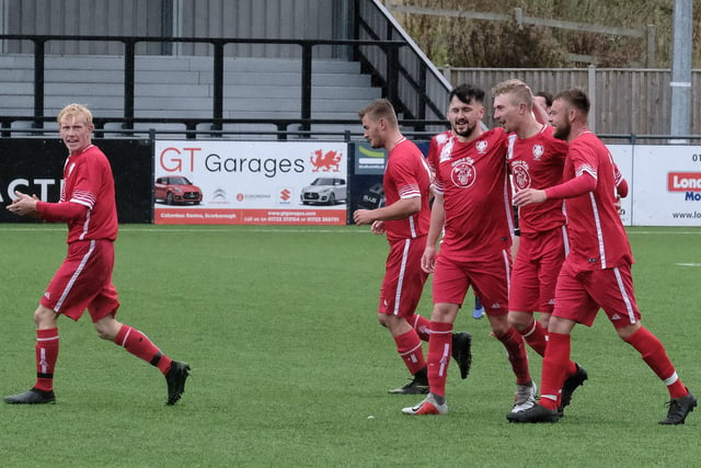 Newlands celebrate one of their five goals at Itis Itis Rovers