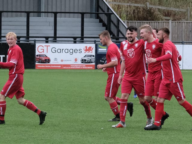 Newlands celebrate one of their five goals at Itis Itis Rovers