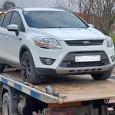 The white Ford Kuga was seized by police