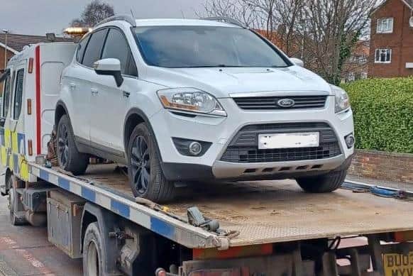 The white Ford Kuga was seized by police