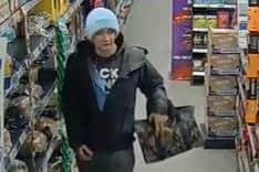 CCTV image of a man police want to speak to following a theft from the Tesco store at Norton, near Malton.
