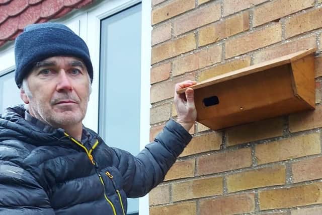 Richard Scullion from Thornton Dale, with a swift box. Richard is the Swift Group's volunteer chief nest box maker.