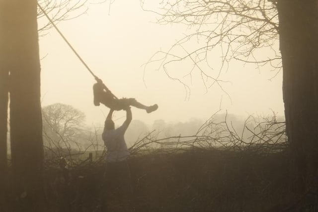 Silhouette of a rope swing at Battersby.