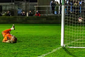 Junior Mondal's effort beats Stafford Rangers keeper Cameron Belford to earn Whitby Town a 1-0 home win. PHOTOS BY BRIAN MURFIELD