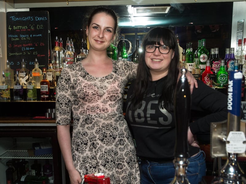 Hostesses Jess & Rhianna behind the bar of The Apollo.
