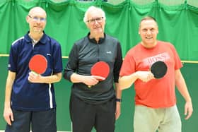 Mad Batters, currently third in Division Two, are, from left, Simon Bekker, Phil Leach and Robert Deegan. PHOTOS BY TONY WIGLEY