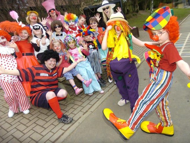 Red Nose Day - Lindhead School youngsters (front, from left) Hester Hardy and Tobias Lenton pictured with other pupils and staff who dressed up for Comic Relief.091181