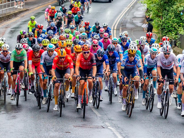 Cluster of cyclists coming through Whitby.