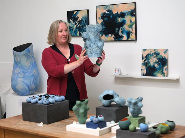Kaitie Braida displaying her complex ceramic designs.