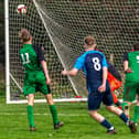 Kieran Wade (no 8) - pictured earlier this season - scored a hat-trick in the win at Goal Sports.