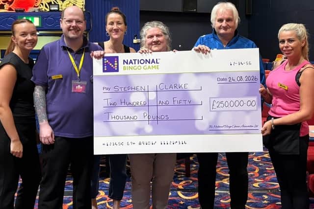 Stephen Clarke and his wife Dawn with the £250,000 cheque and team members of Regal Bingo Bridlington.