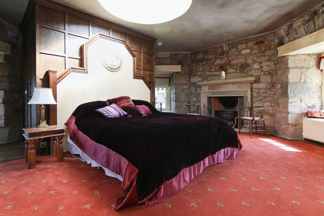 The bedroom is accessed via a spiral stone staircase and is generous in size, with its own en-suite facilities.
