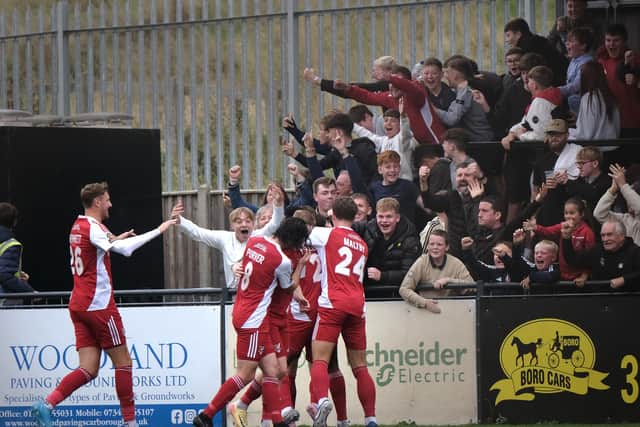 Boro celebrate their winner against National League North leaders Scunthorpe. Photo by Richard Ponter