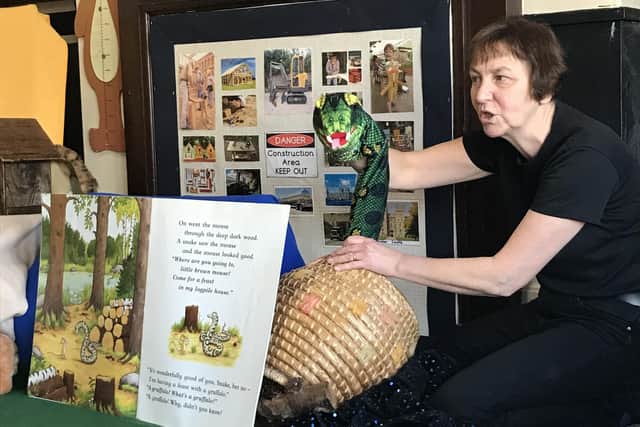 Carol Burton from Puppets, Plays and Story Days brings the Gruffalo to life