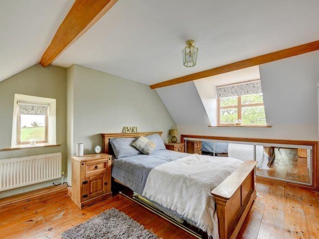 Another double bedroom with space and charm.
