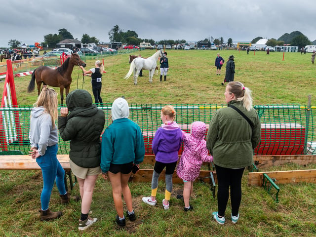 Visitors to the show watching class 52 Pure Bred Arab Colt Gelding or Filly 3 years old and upwards in Hand in the main ring.
