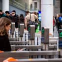 Commuter at ticket gateline.