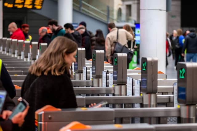 Commuter at ticket gateline.
