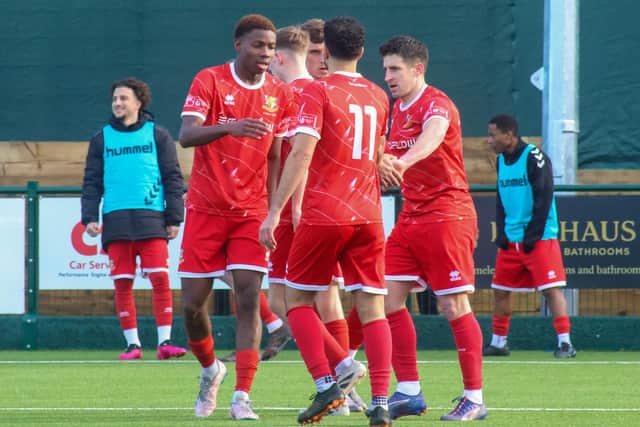 Brid Town striker Michael Coulson's opening goal is celebrated by - Destiny Nnenanya and Ahmed Salam (no 11) at Ponte. Photo by Ewan Cameron