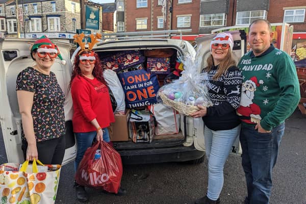 Scarborough landlords deliver Christmas - L-R - Ellen Senior - manager at The Whitby Way, Chantelle Mainprize - barmaid at The Ship, Ladlords Tammy Goldstone and Ian Smith.
