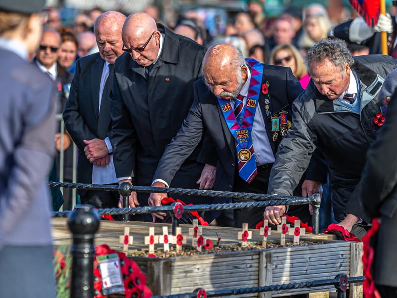 Poppy wreaths placed at Whitby's war memorial in memory of the fallen.