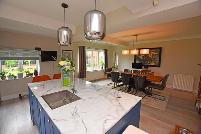 The open plan living kitchen and dining area.