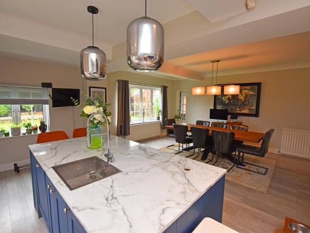 The open plan living kitchen and dining area.