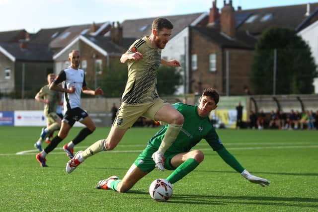 Boro midfielder Kieran Glynn looks to round Marine keeper Matty Corran. PHOTOS BY ZACH FORSTER