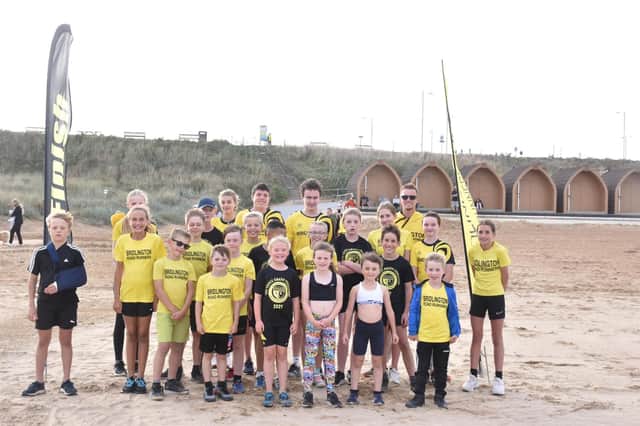 The Bridlington Road Runners juniors line up before their Eddie Knapp Challenge beach race PHOTOS BY TCF PHOTOGRAPHY