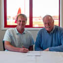 Bridlington Town chairman Dan Rogers and Boro chairman Trevor Bull sign the ground share agreement earlier this summer.