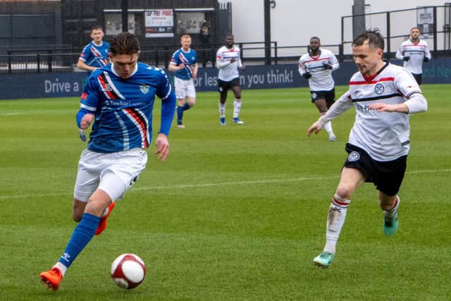 Layton Watts takes on the Hednesford defence. Photo by Jesse Harland