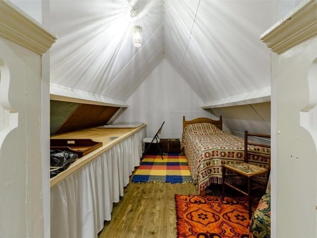 One of two converted loft bedrooms.
