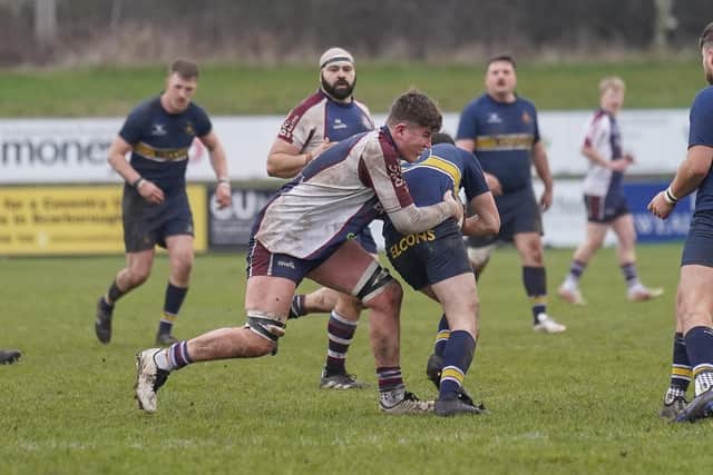 Will Leah tackles for league leaders Scarborough. Photo by Charlie Hopper