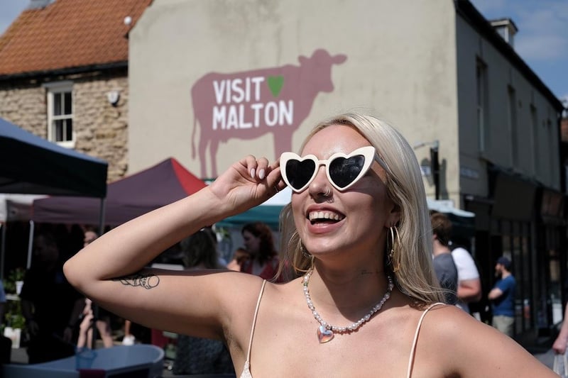 A festival goer basked in the sunshine.