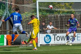 Nathan Thomas' brilliant 15th-minute header put Whitby Town ahead against Bamber Bridge. PHOTODS BY BRIAN MURFIELD