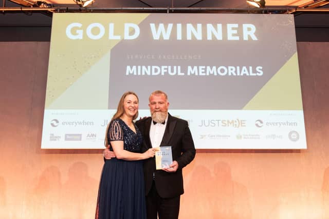 Anna and Adrian, the owners of Mindful Memorials picking up their award for service excellence at the QEII Centre in Westminster