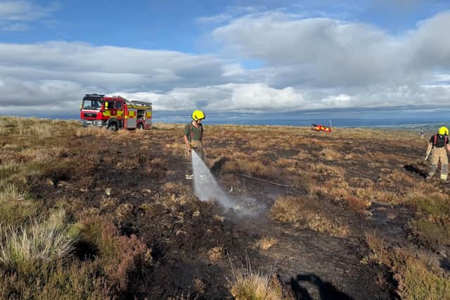 The blaze in the Langdale and Fylingdales Moor area has been officially downgraded from a major incident by North Yorkshire Fire and Rescue Service.