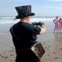 Taking a photo on the beach at Whitby Steampunk Weekend.
Picture by Simon Hulme.