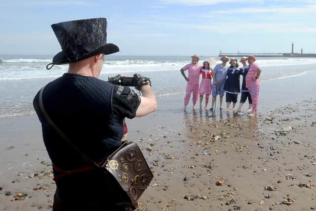 Taking a photo on the beach at Whitby Steampunk Weekend.
Picture by Simon Hulme.