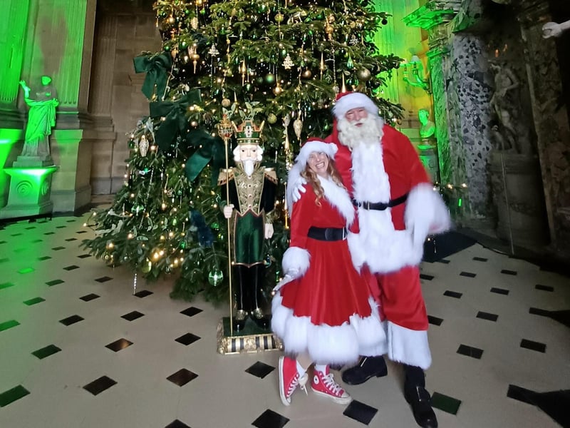 Father Christmas and Mrs Christmas in front of the 28ft tree. photo: Emma Atkins