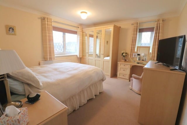 The property has four bedrooms, one of which has fitted wardrobes.