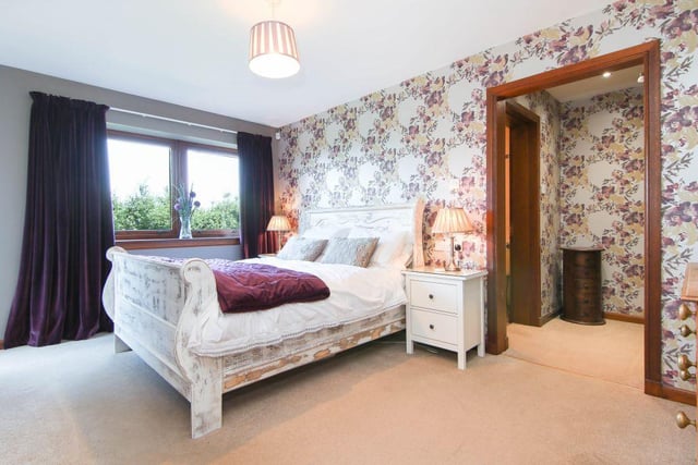 The property boasts six bedrooms in total, with three of these complete with en-suite facilities. One of the bedrooms is currently being used as a home office.
