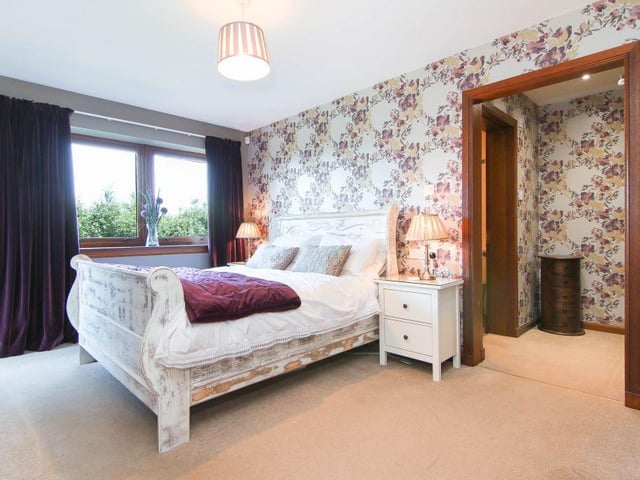The property boasts six bedrooms in total, with three of these complete with en-suite facilities. One of the bedrooms is currently being used as a home office.