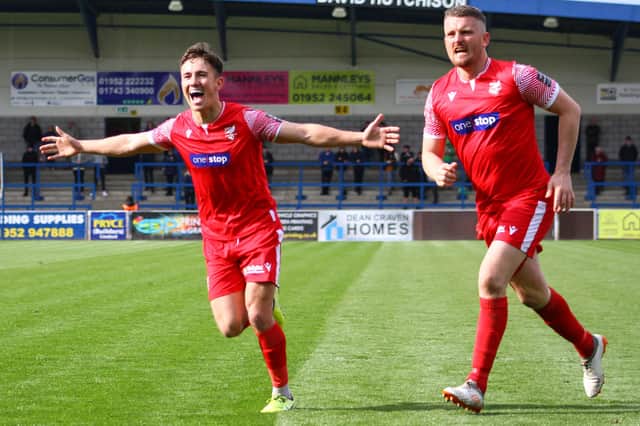 Lewis Maloney, left, and Ryan Qualter celebrate Dom Tear's goal which put Boro ahead at AFC Telford United on Saturday. PHOTOS BY ZACH FORSTER